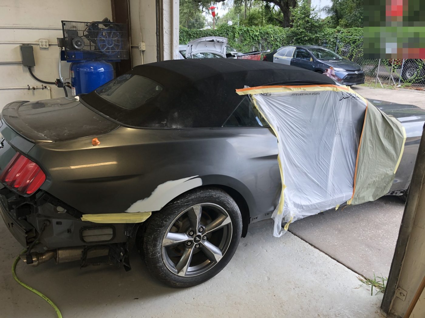 Convertible masked and prepped for body and paint work