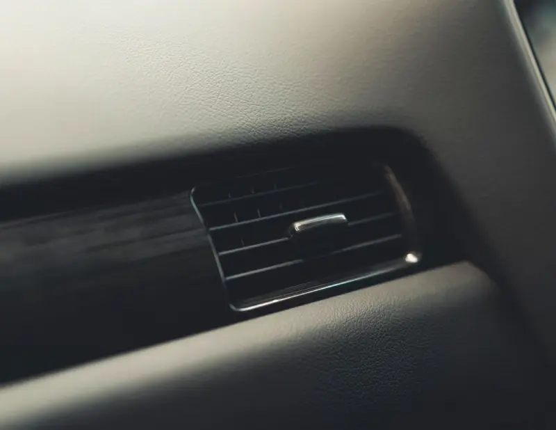 Car air-conditioning vents and dashboard controls